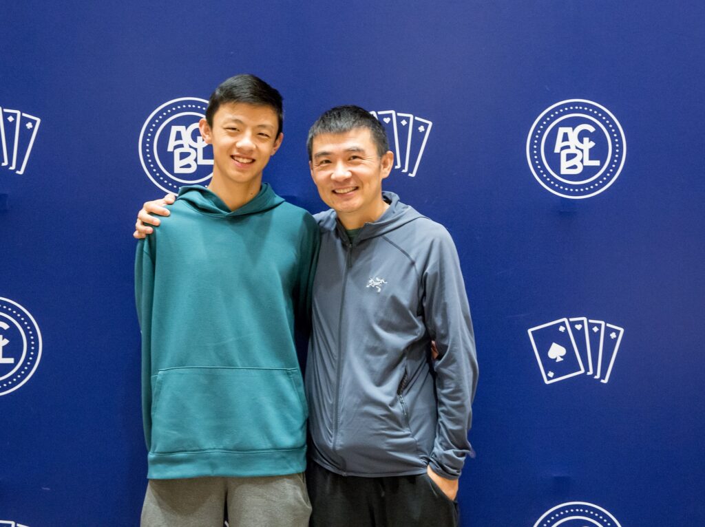 Father-son Ge duo wins Red Ribbon Pairs